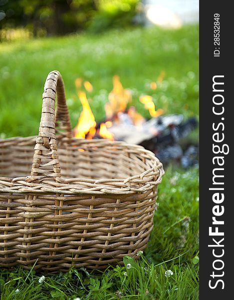Basket and camp fire in the village