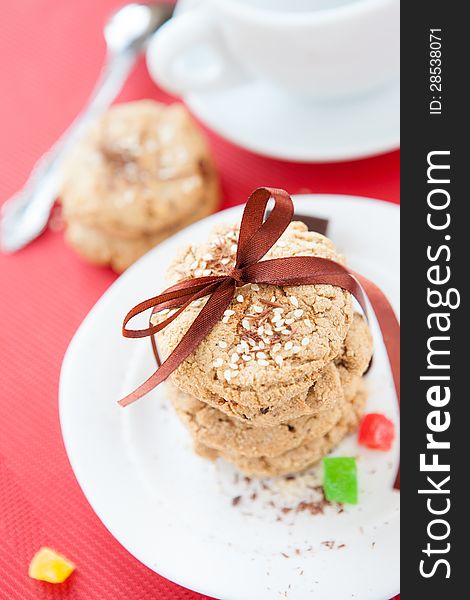 Cookies with nuts and chocolate, a cup of tea