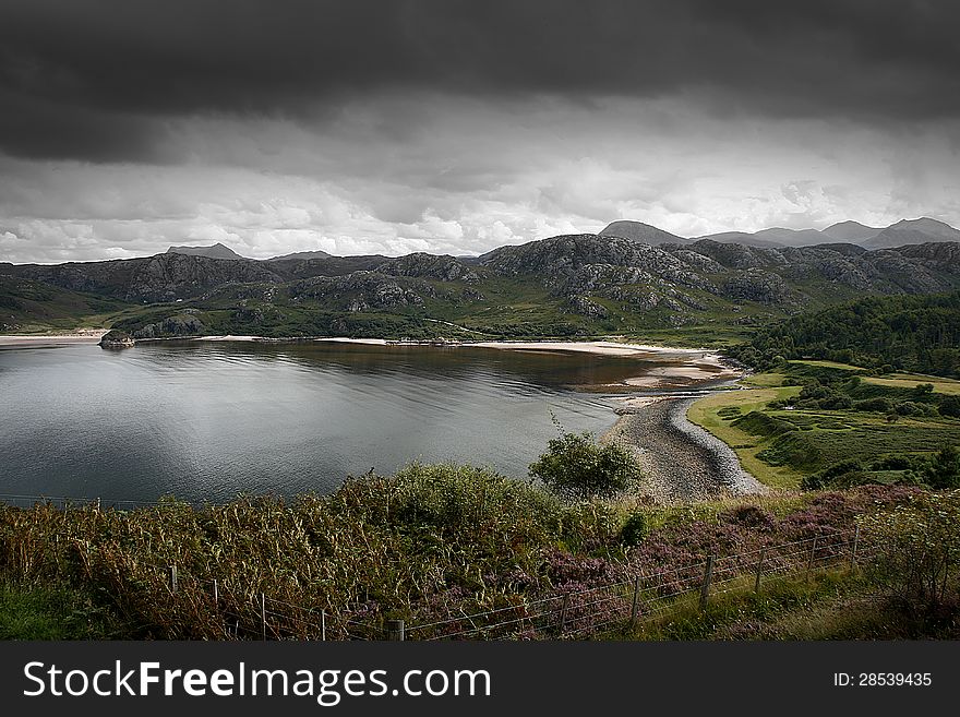 Scotland landscape with dark sky. Scotland landscape with dark sky