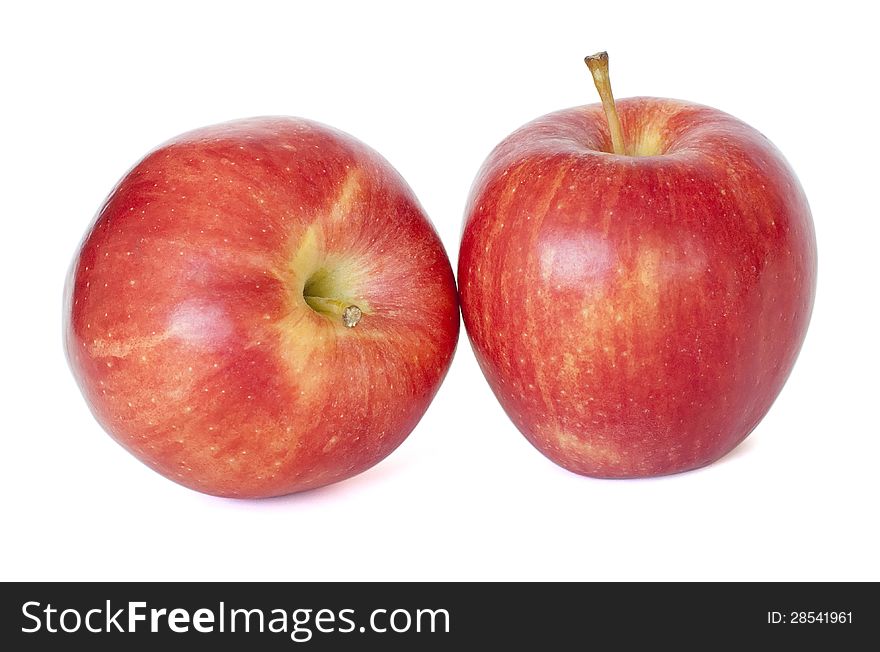 Two ripe red apples isolated on the white background. Two ripe red apples isolated on the white background