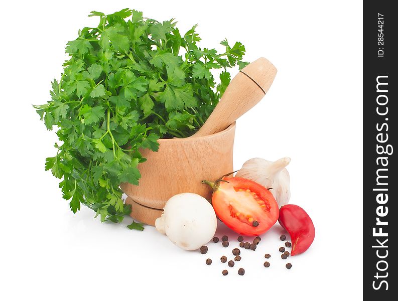 Wooden mortar with parsley, tomato and spices, food ingredient photo. Wooden mortar with parsley, tomato and spices, food ingredient photo