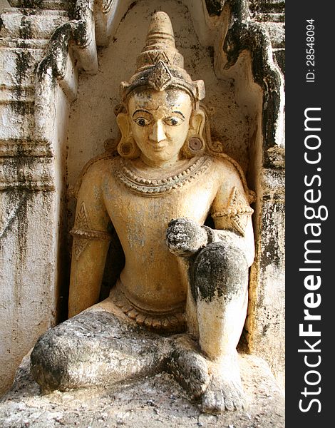 Statue in one of the ancient temples of Bagan. Statue in one of the ancient temples of Bagan