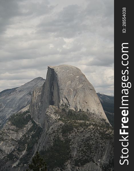 Shot of Half Dome, eye level, cloudy sky. Shot of Half Dome, eye level, cloudy sky.