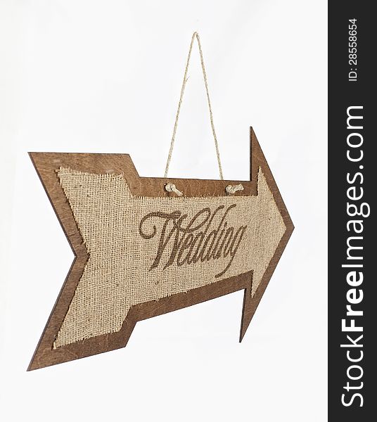 Burlap wedding sign arrow on the wood