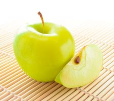 Yellow Apple With Apple Slice Stock Images