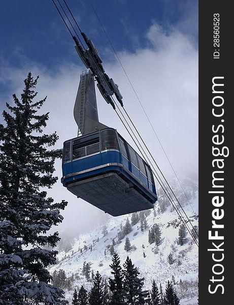 Spectacular view to the mountains and blue ski tram at Snowbird ski resort in Utah