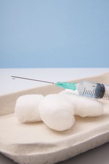 Syringe And Round Gauze Ball Royalty Free Stock Image Syringe And Round Gauze Ball Royalty Free Stock Image