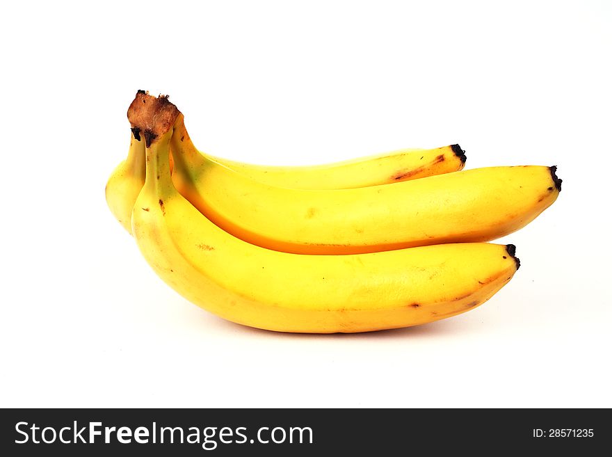 Yellow ripe bananas group on isolated white background. Yellow ripe bananas group on isolated white background