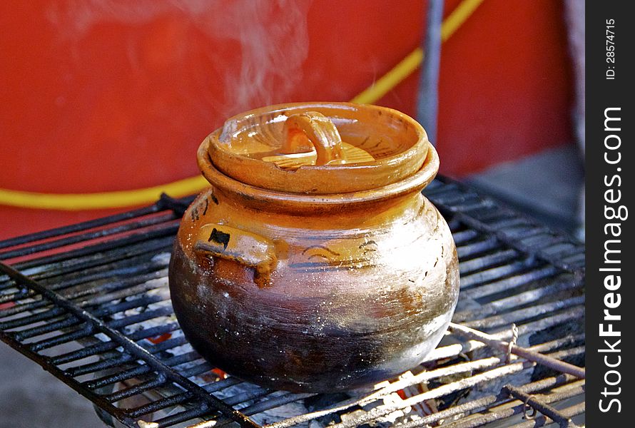 Traditional handcrafted earthen cooking pot. Traditional handcrafted earthen cooking pot