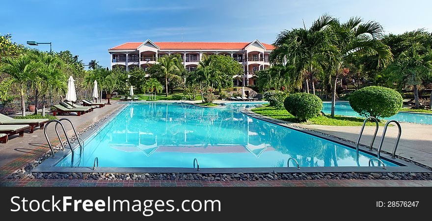 Beautiful tropical swimming pool at luxury resort. Beautiful tropical swimming pool at luxury resort