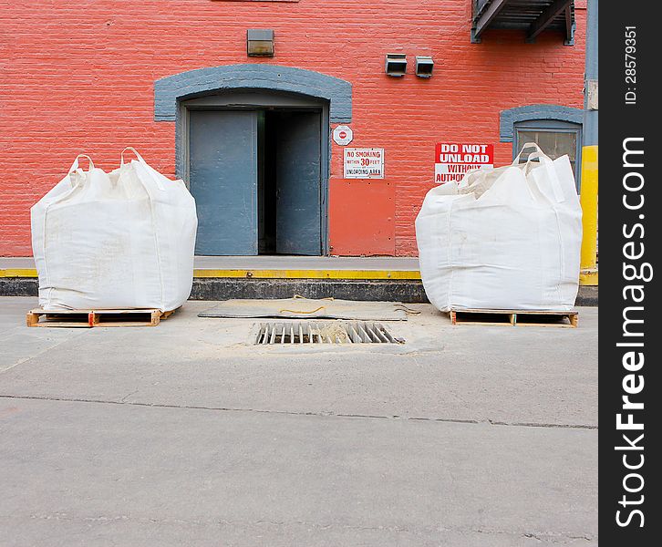 Bales of grain waiting to be processed. Bales of grain waiting to be processed.