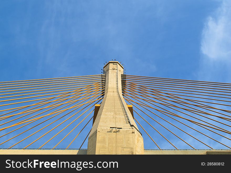 The tower of cable bridge with blue sky