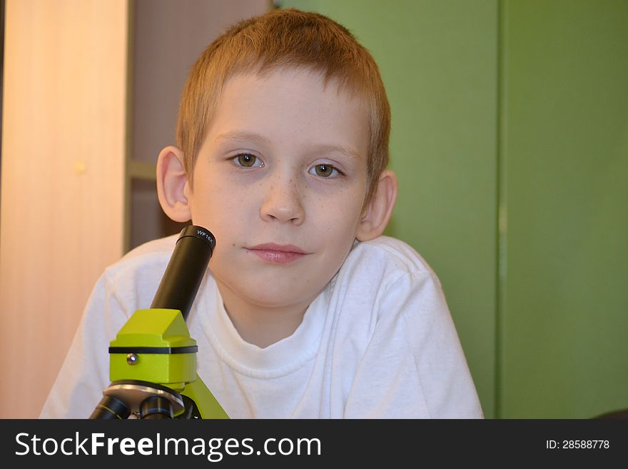 Teenager And Microscope