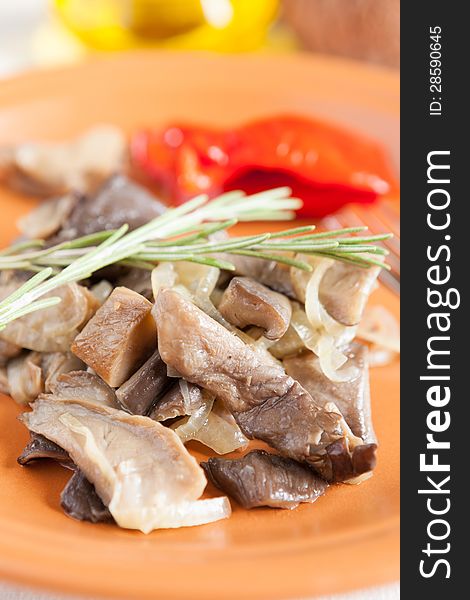 Roasted Oyster Mushrooms On A Ceramic Plate