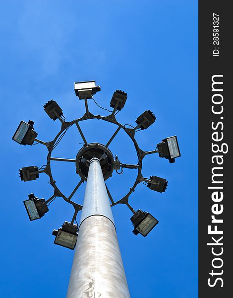 Street lamp pole on blue sky background