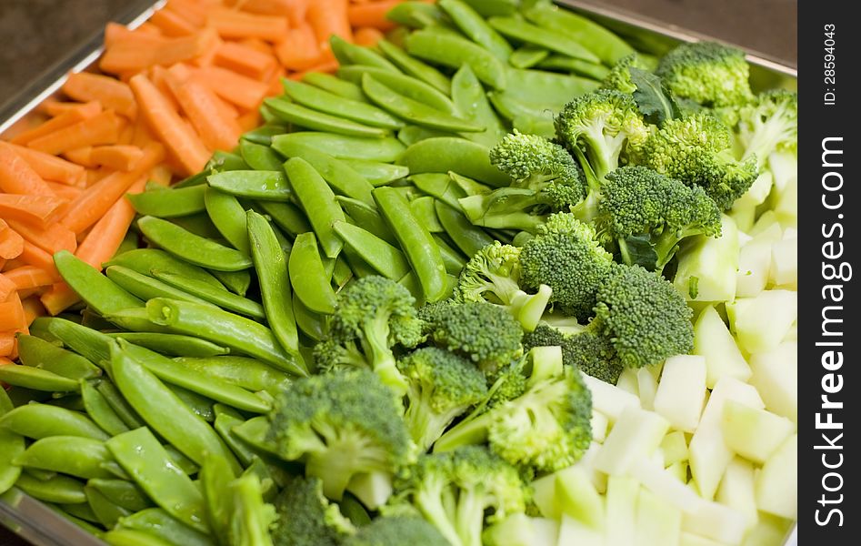 Image shows a large plate of different fesh vegetables as closeup. Image shows a large plate of different fesh vegetables as closeup.