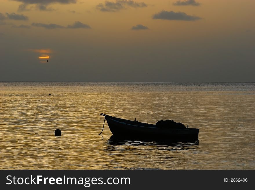 Fisherboat At Sunset