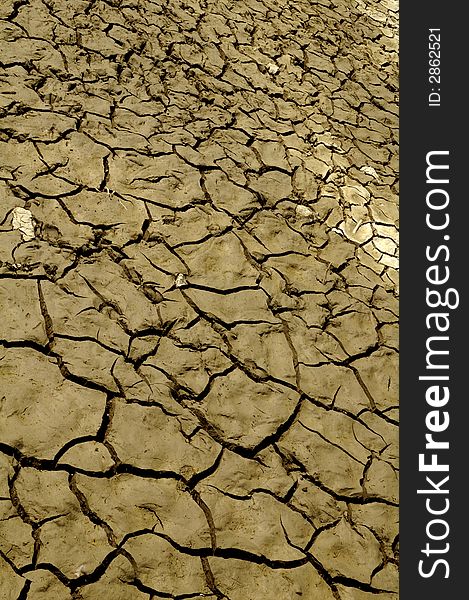 Dried cracked earth suffering from a waterless period. Dried cracked earth suffering from a waterless period