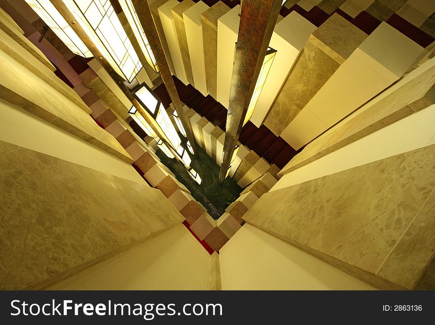 Marble stairway in yellow lights