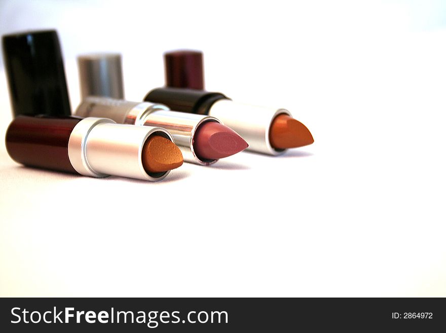 Three different shades of lipsticks.