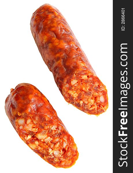 Cuted spicy home-made sausage isolated on white background