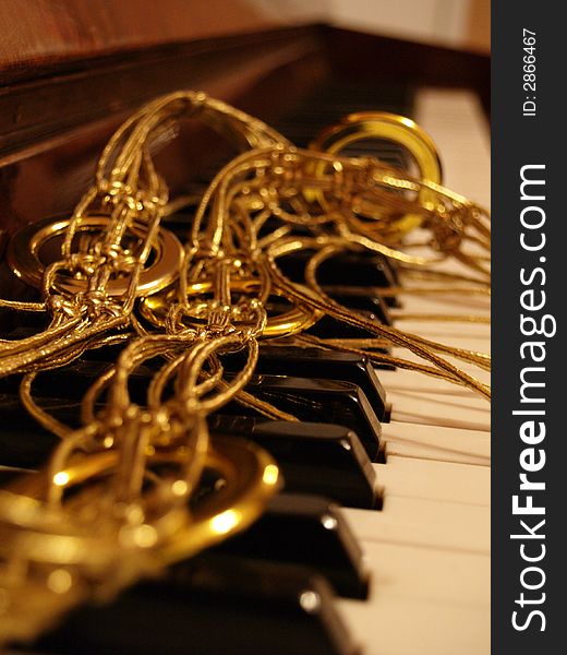 Upright piano with gold filaments