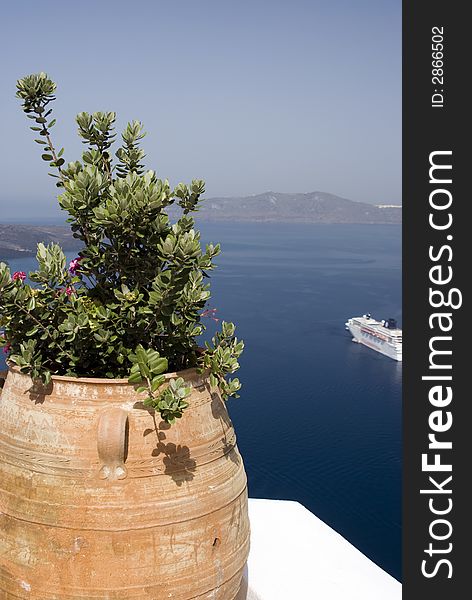 Harbor view of cruise ship with flower pot santorini greek islands. Harbor view of cruise ship with flower pot santorini greek islands