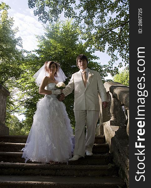 Bride and groom in the park