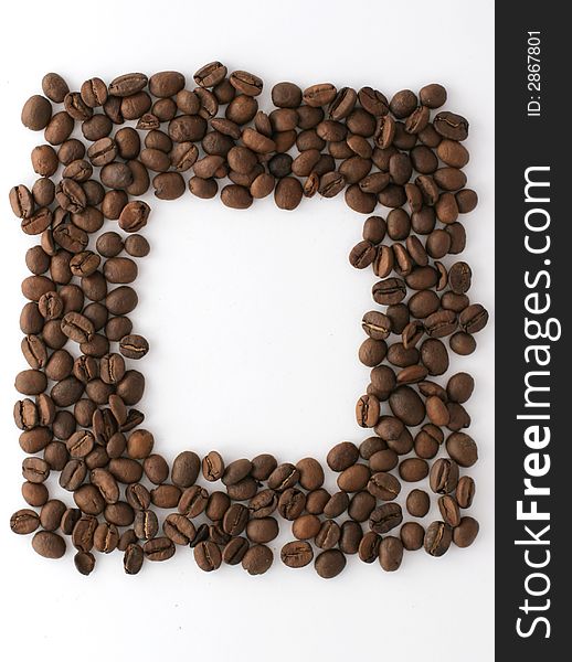 Coffee beans arranged in a frame. Coffee beans arranged in a frame