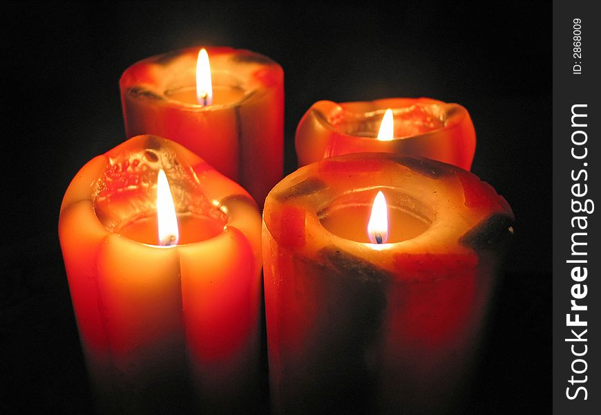 Big and colorful decorative candles glow in the dark. Big and colorful decorative candles glow in the dark