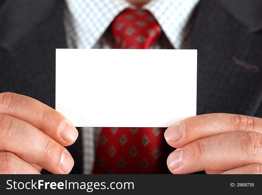 Businessman holding blank visiting card. Businessman holding blank visiting card