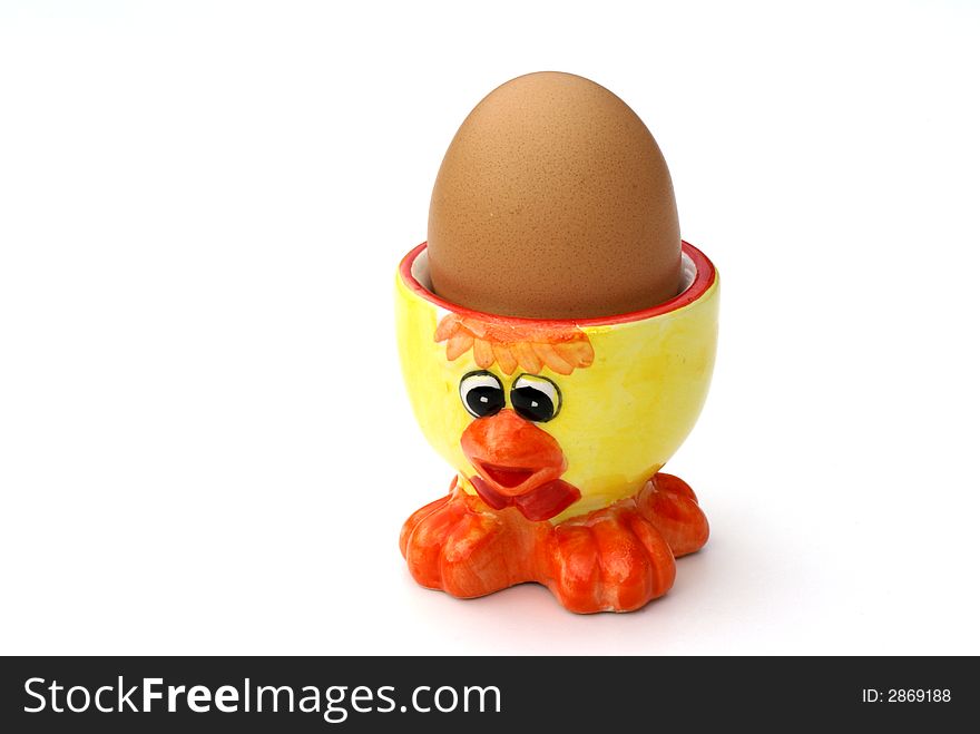 Ducky egg cup with egg in it. Ducky egg cup with egg in it.