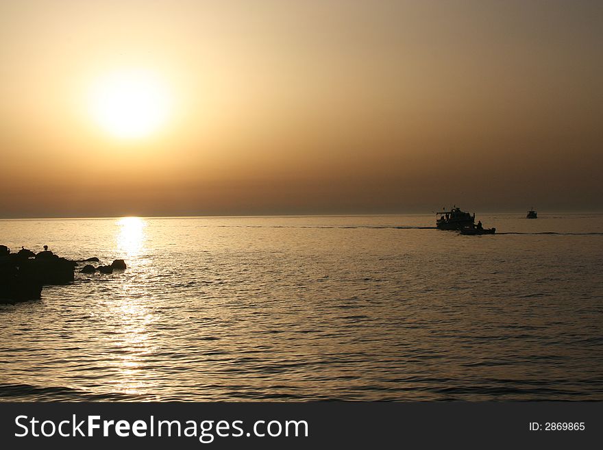 Boat at sunset, Rovinj, Croatia