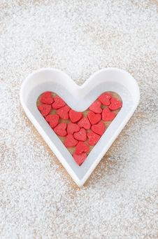 Sugar Hearts In White Baking Dish On A Board Sprinkled With Powd Royalty Free Stock Image Sugar Hearts In White Baking Dish On A Board Sprinkled With Powd Royalty Free Stock Image