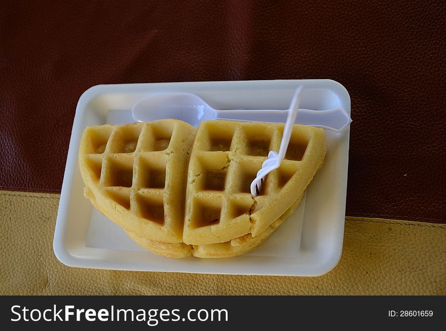 Freshly baked waffles with Fresh strawberries.