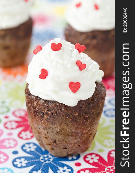 Chocolate cake with whipped cream, selective focus