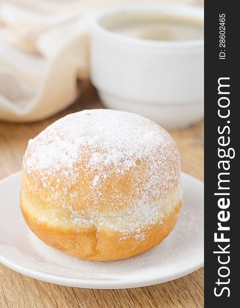 Sweet Donut On A Plate And Cup Of Coffee Closeup