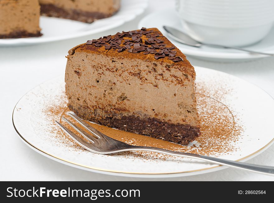 Piece Of Chocolate Cheesecake On A Plate Closeup Horizontal