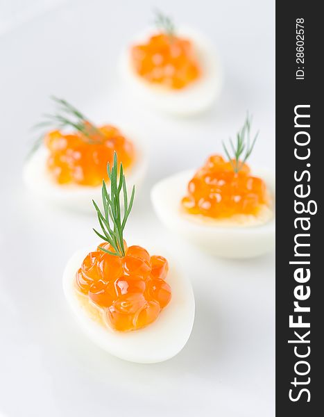 Quail eggs with caviar and dill