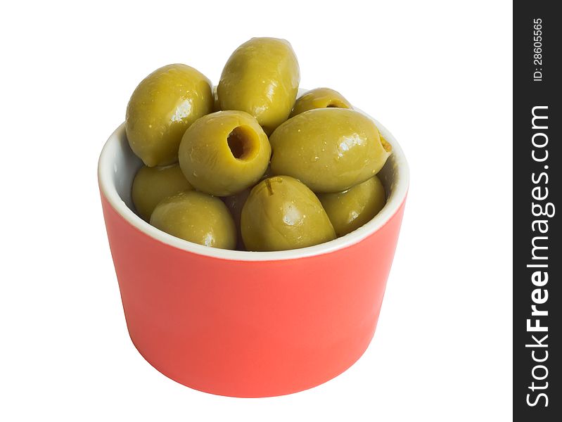 Olives in red bowl isolated on white background