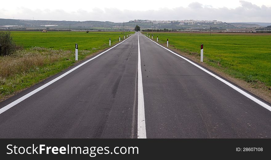 Countryside road with white stripe in the middle