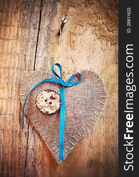 Decoration On Wooden Background With Fabric Heart