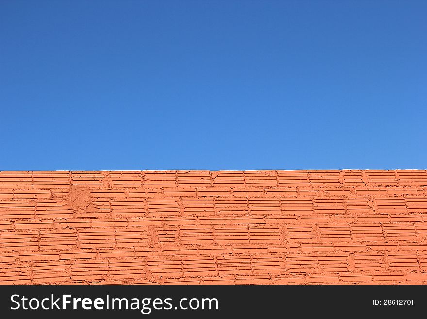 Clear Blue Sky Brick Wall