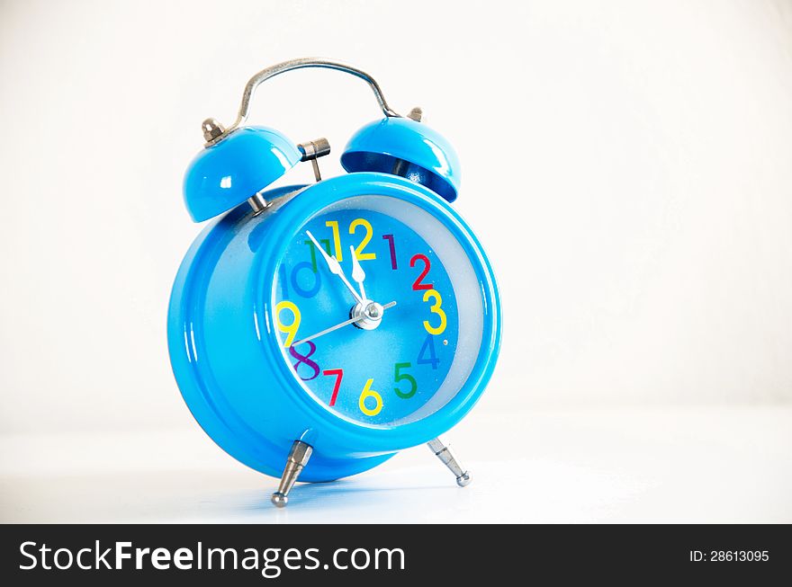 Alarm clock on white background.