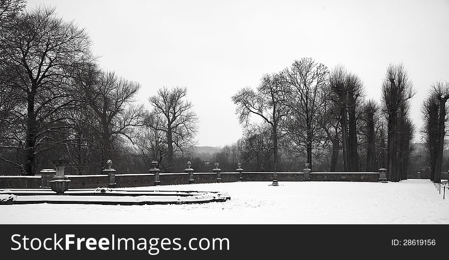 French classic vase ornaments in snowy garden. French classic vase ornaments in snowy garden