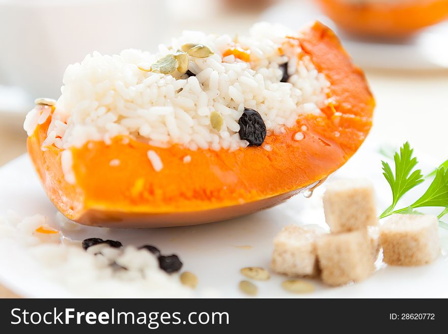 Pumpkin with rice, cooked in the oven