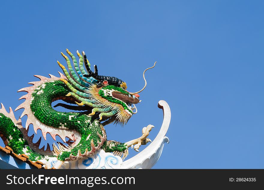 Green Chinese Dragon with blue sky. Green Chinese Dragon with blue sky