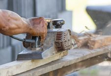 Carpenter Working With Electric Planer Stock Image Carpenter Working With Electric Planer Stock Image