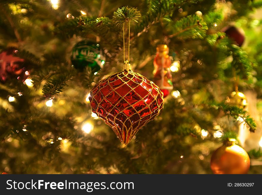 Christmas tree ornaments hanging on a tree