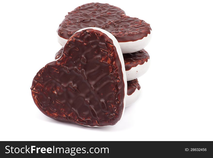 Stack of Gingerbread Hearts with Dark and White Chocolate Glazed isolated on white background